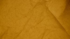 yellow parchment paper in close up photography