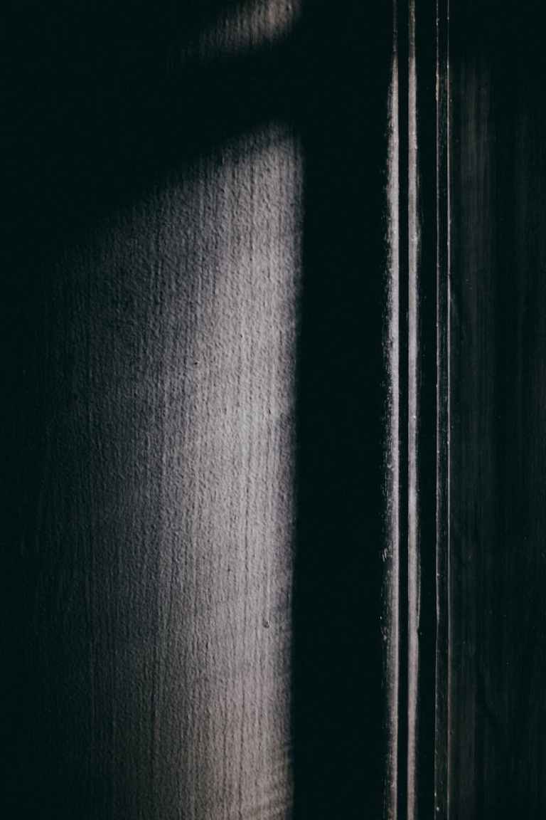 black surface illuminated with sunlit