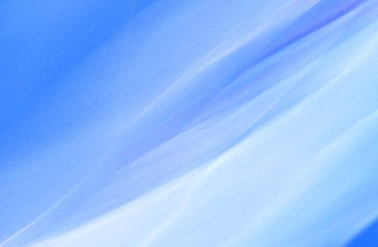 abstract blue and white light streaks on a soft background